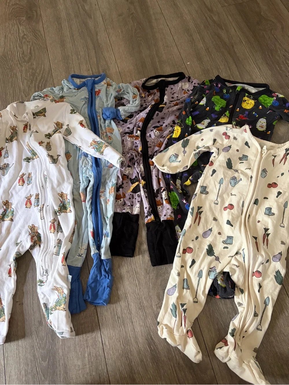 Assorted Kids Footed Pajama One-Pieces – White, Light Blue, Purple, Black